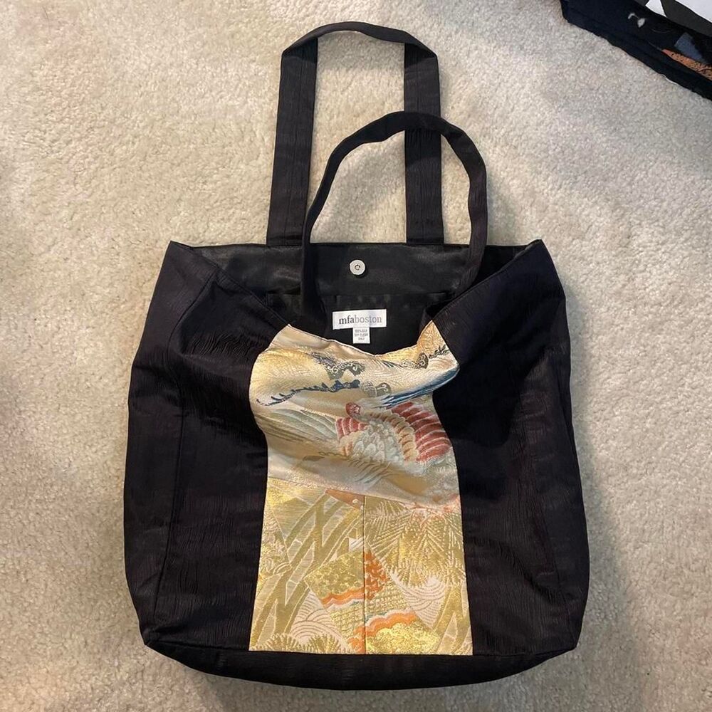 This is an MFA Boston branded black tote bag